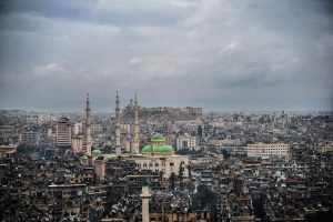 downtown Damascus in the upscale neighborhood of Abu Ramaneh , the picture high lights the religious diversity of Syria.