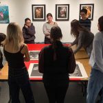 Art history class in the gallery, choosing the Final artwork for the exhibition