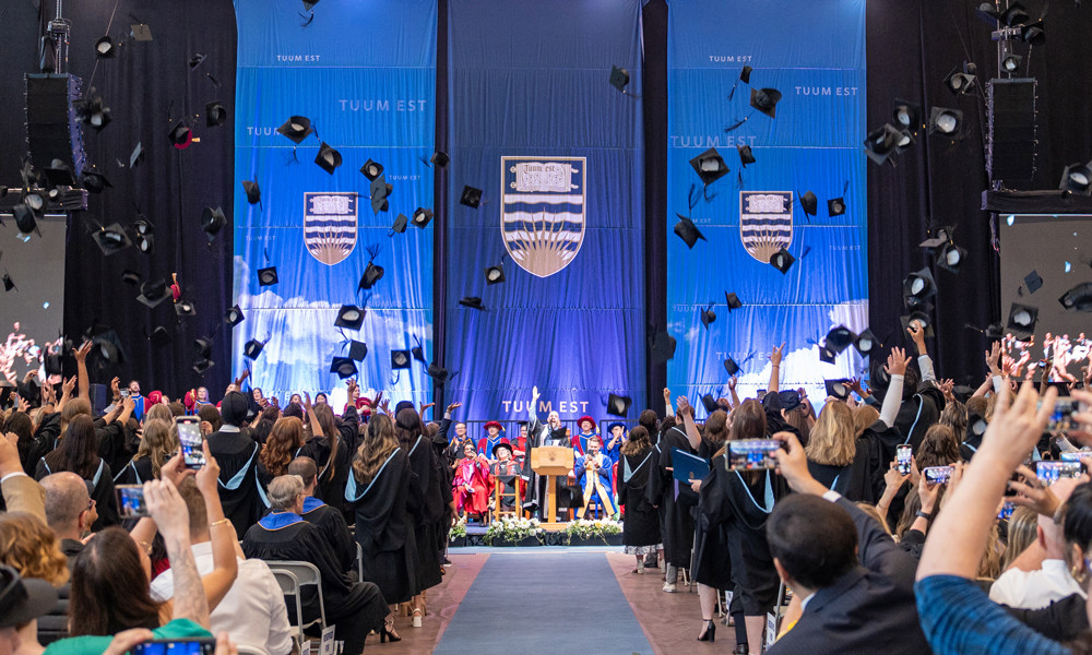 caps are tossed at the end of a graduation ceremony