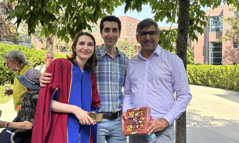 DAHU doctoral student Sephideh Saffari (left), with her partner (centre), and supervisor Hussein Keshani (right) at the FCCS celebration after convocation